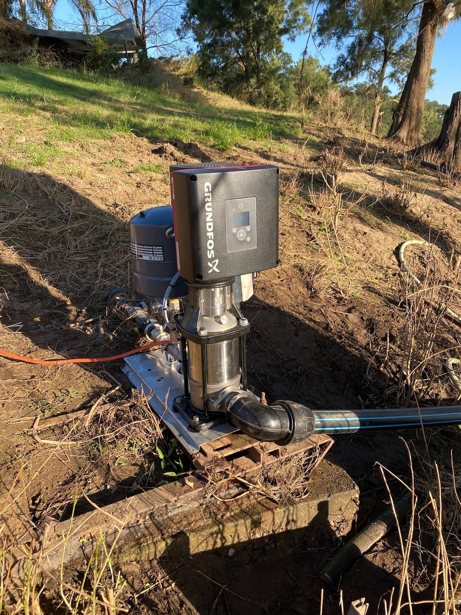 Grundfos pressure pump mounted on a stand